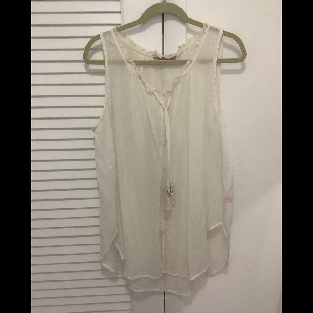 Calypso silk sleeveless blouse with ruffle collar & tassel front